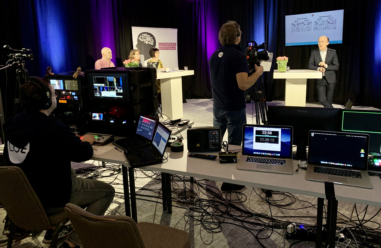 A studio setup for live streaming a virtual event