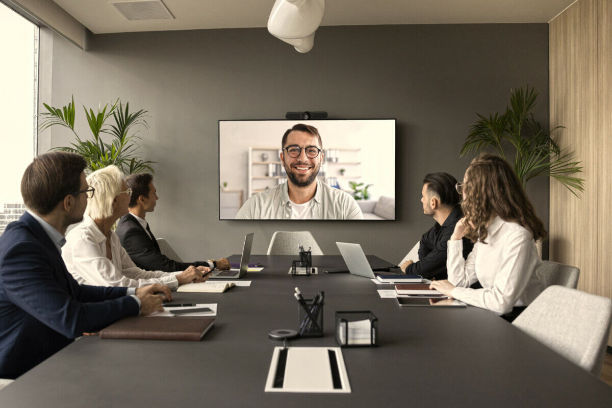 a picture of a team in a meeting kicking off 2026 serving as a header image for an article on the Slido blog